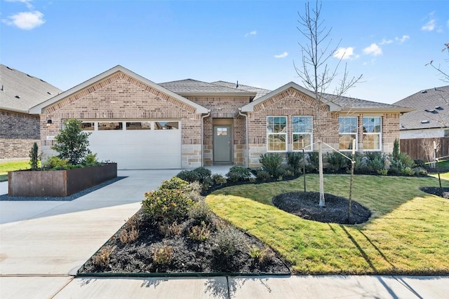 single story home featuring a front lawn and a garage