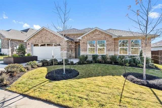 single story home with a front lawn and a garage