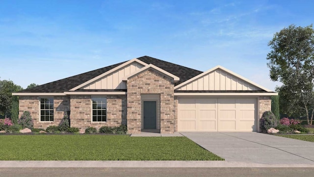 view of front of property featuring a garage and a front lawn