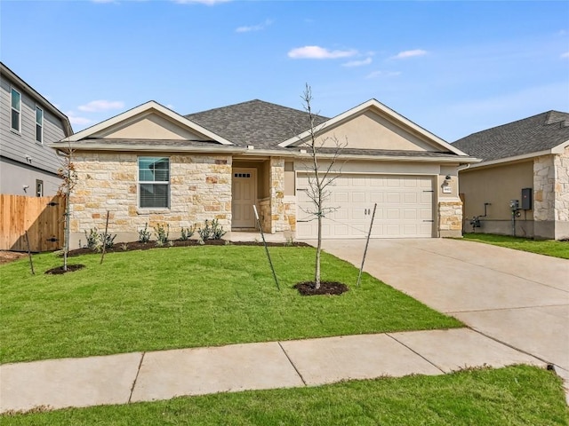 ranch-style house with a garage and a front yard