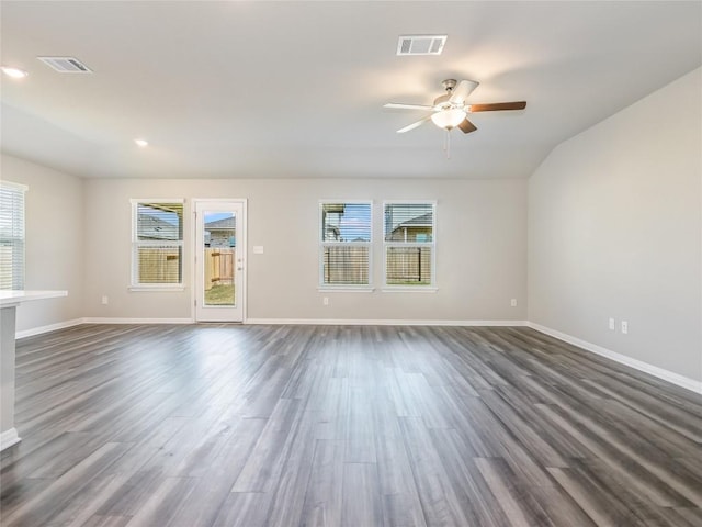 unfurnished room with ceiling fan and dark wood-type flooring