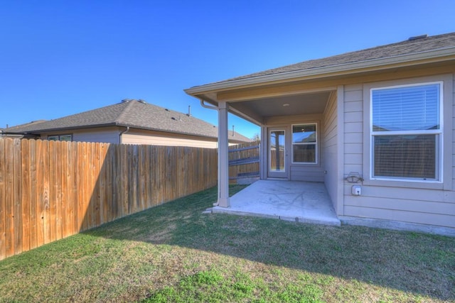 view of yard featuring a fenced backyard and a patio