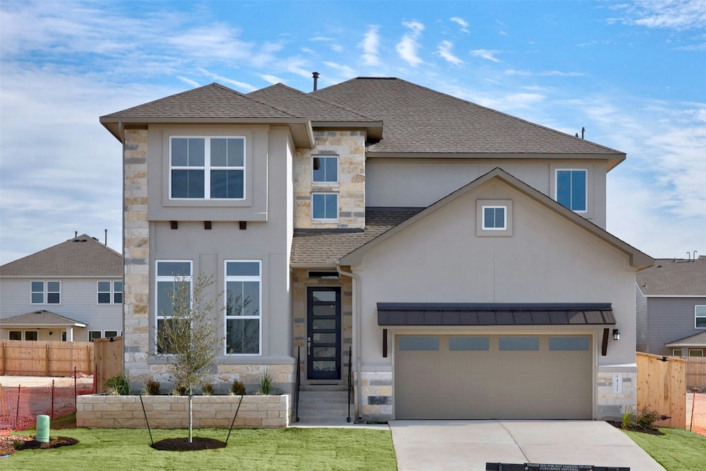 view of front of property with a front yard