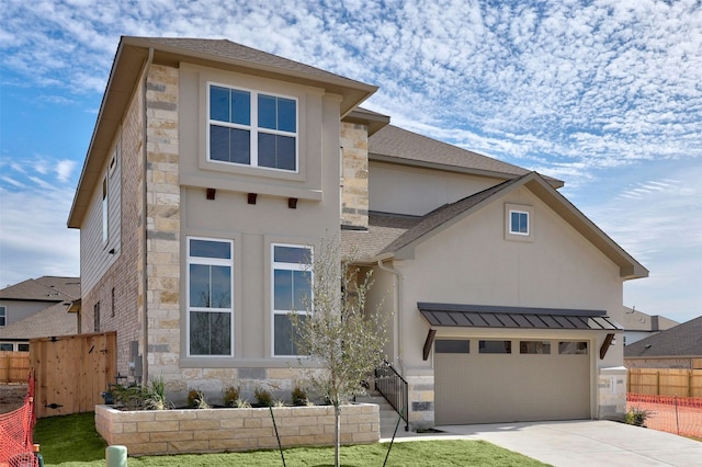 view of front of home featuring a garage