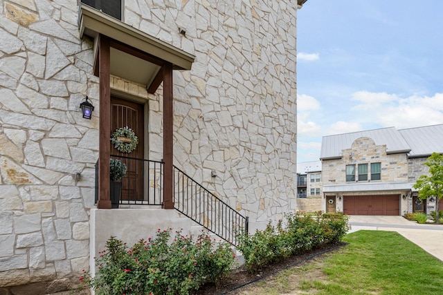 entrance to property featuring a garage