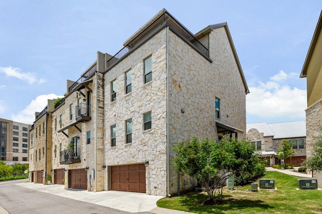 view of building exterior featuring a garage