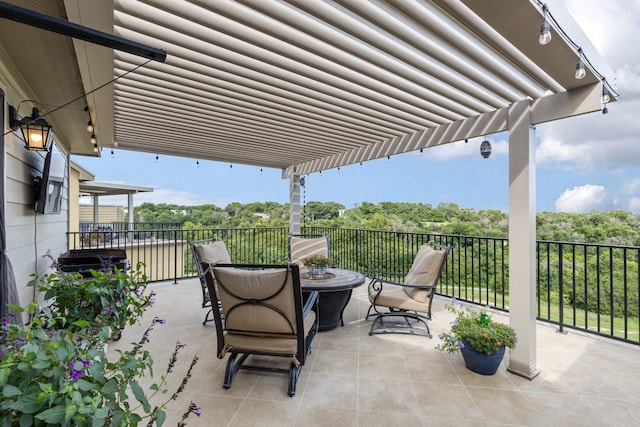 view of patio / terrace featuring a fire pit and a pergola