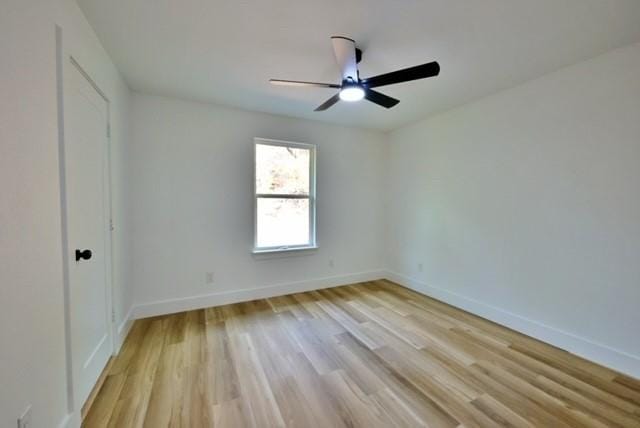 unfurnished bedroom featuring ceiling fan and light wood-type flooring