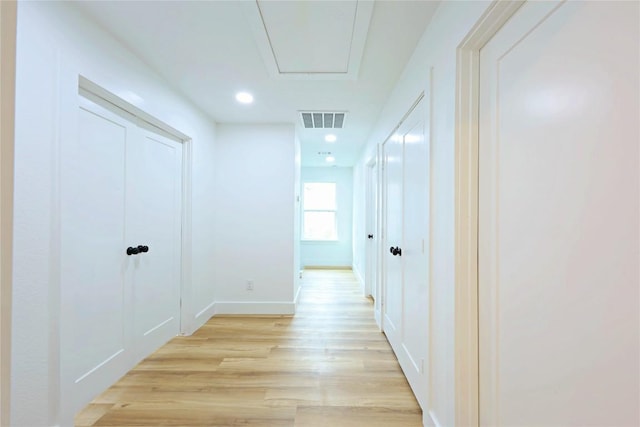 hall featuring light hardwood / wood-style flooring