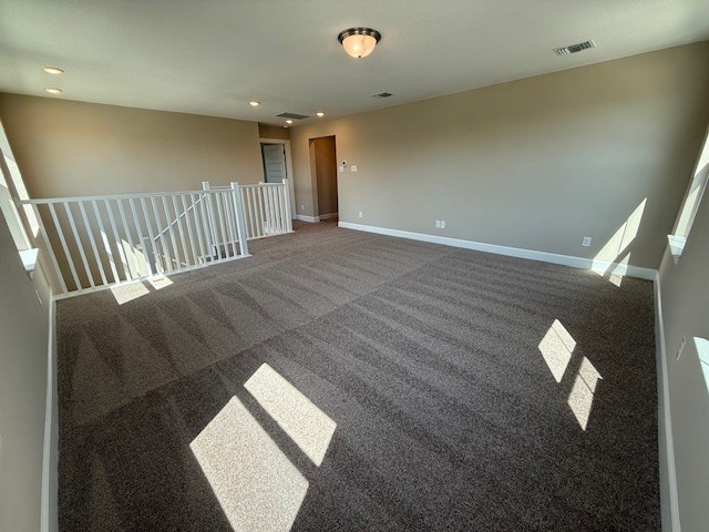 132 Alistair Dr, Georgetown, TX 78633 - carpeted empty room featuring baseboards and recessed lighting
