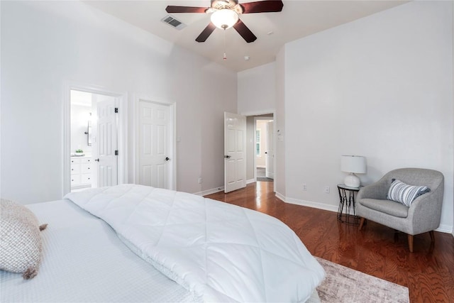 504 River Down Rd, Georgetown, TX 78628 - bedroom with wood finished floors, ensuite bathroom, a towering ceiling, and a ceiling fan
