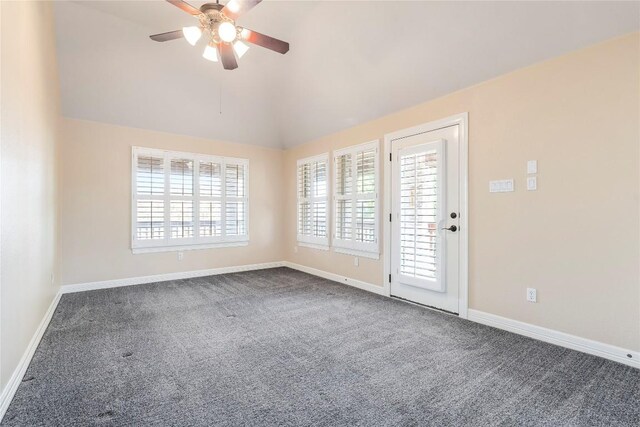 504 River Down Rd, Georgetown, TX 78628 - empty room with dark colored carpet, vaulted ceiling, and ceiling fan