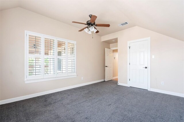 504 River Down Rd, Georgetown, TX 78628 - unfurnished bedroom with vaulted ceiling, dark colored carpet, and ceiling fan