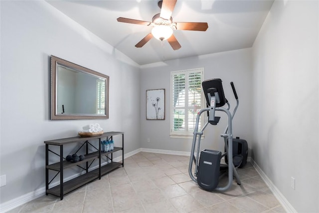 exercise room with ceiling fan and light tile patterned floors