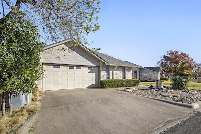 ranch-style home with a garage