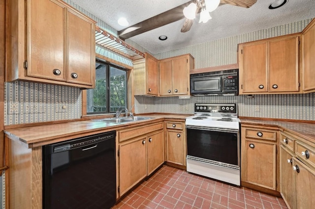 13000 Grubstake Gulch St, Bee Cave, TX 78738 - kitchen with black appliances, a sink, a textured ceiling, brick patterned flooring, and wallpapered walls