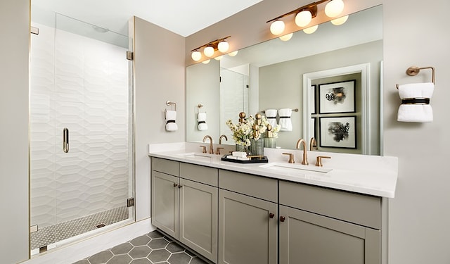 bathroom featuring vanity, tile patterned floors, and walk in shower