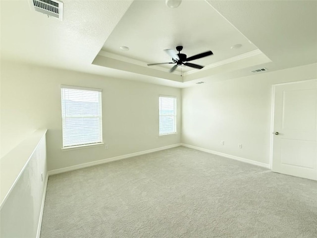 247 Fawn Ridge Dr, Copperas Cove, TX 76522 - carpeted empty room featuring a raised ceiling, baseboards, and a ceiling fan