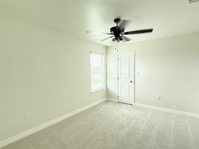 247 Fawn Ridge Dr, Copperas Cove, TX 76522 - unfurnished room with a ceiling fan, light colored carpet, baseboards, and a textured ceiling