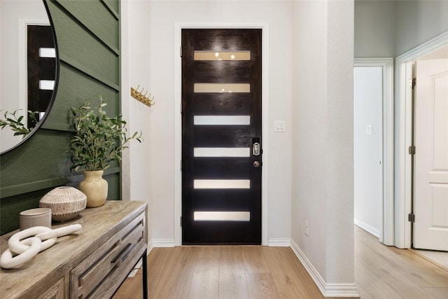 entryway with light wood-type flooring