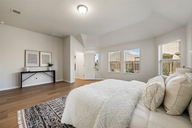 bedroom featuring hardwood / wood-style flooring