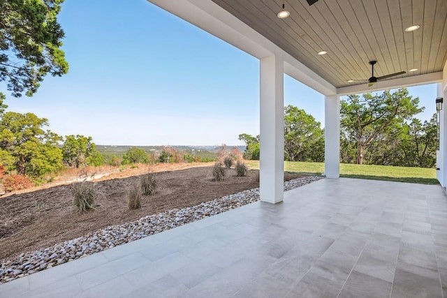 view of patio with ceiling fan