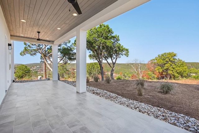 view of patio / terrace featuring ceiling fan