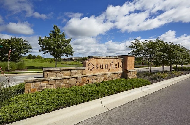 view of community sign