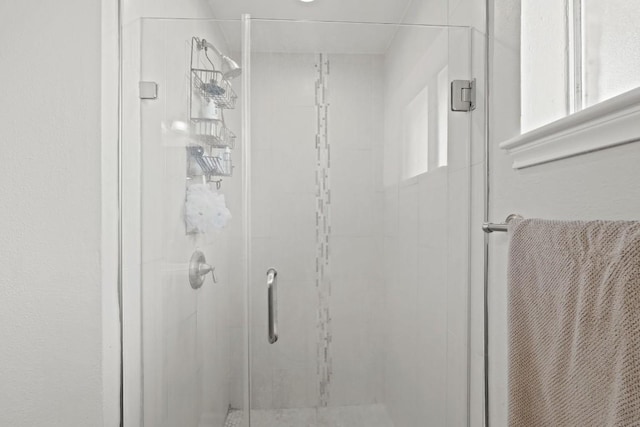 full bath featuring a stall shower