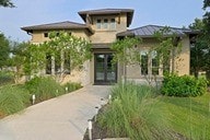 225 Skyflower Dr, Georgetown, TX 78628 - view of front of home with driveway
