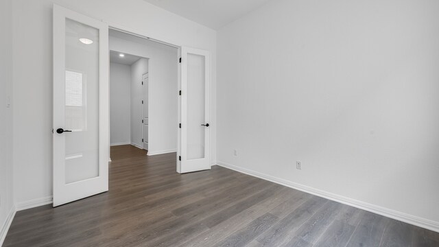 113 Golden Sage Ave, Georgetown, TX 78633 - empty room featuring baseboards and dark wood-style floors