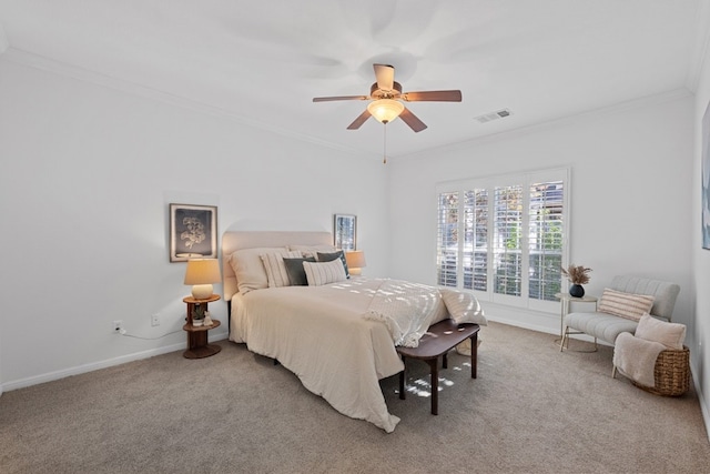 bedroom with baseboards, carpet, visible vents, and crown molding