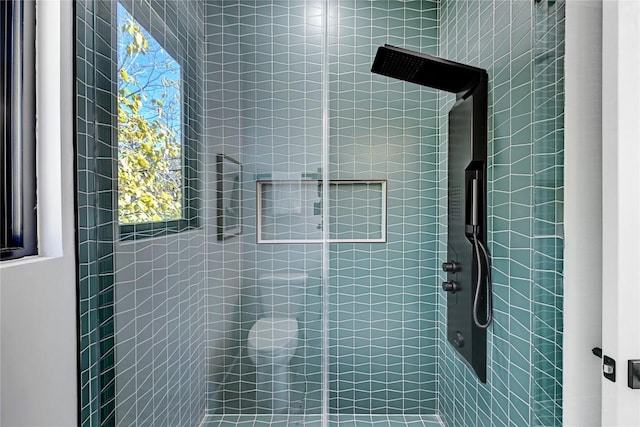 bathroom featuring a shower