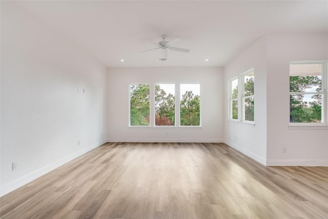189 Mauna Kea Ln, Bastrop, TX 78602 - unfurnished room featuring baseboards, light wood-type flooring, a ceiling fan, and recessed lighting