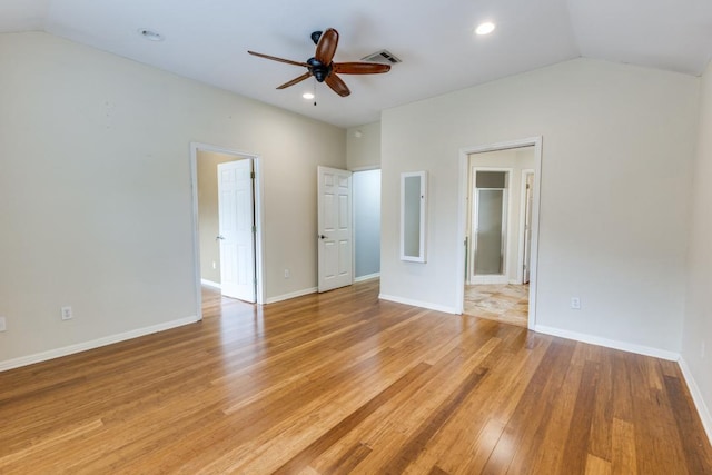 interior space with visible vents, lofted ceiling, baseboards, recessed lighting, and light wood-type flooring