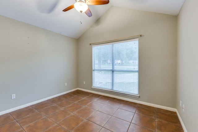 spare room with baseboards, tile patterned flooring, a ceiling fan, and lofted ceiling