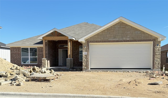 view of front of home with a garage