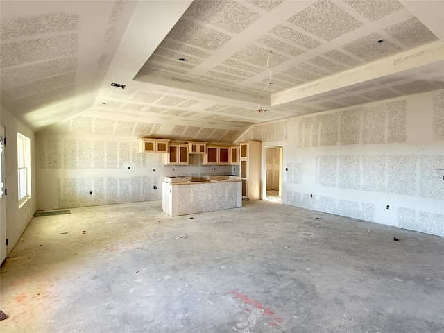 unfurnished living room featuring concrete floors