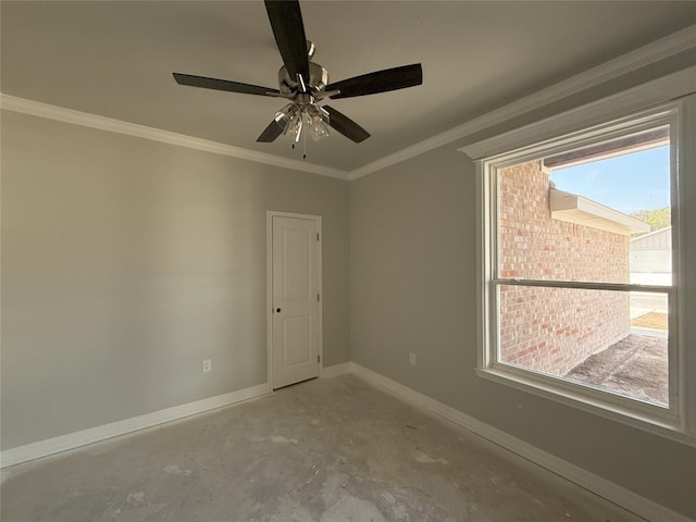 unfurnished room with ceiling fan, concrete floors, and crown molding