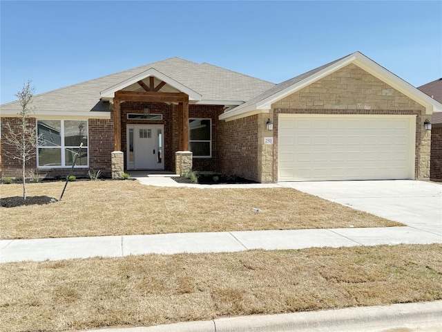 view of front of property with a garage, brick siding, concrete driveway, and a shingled roof