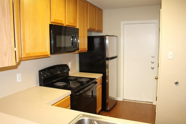 kitchen with black appliances