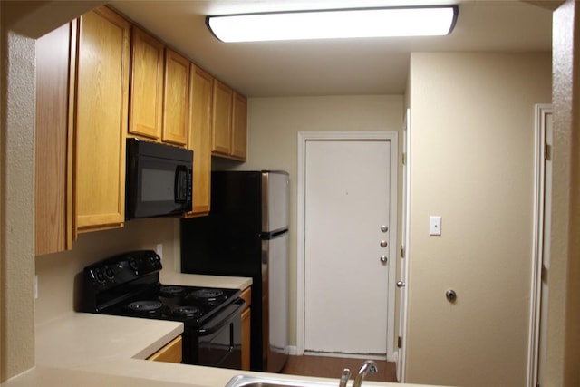 kitchen featuring black appliances