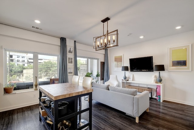 living room featuring dark wood-type flooring