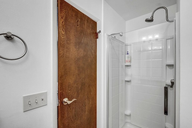 bathroom featuring a shower