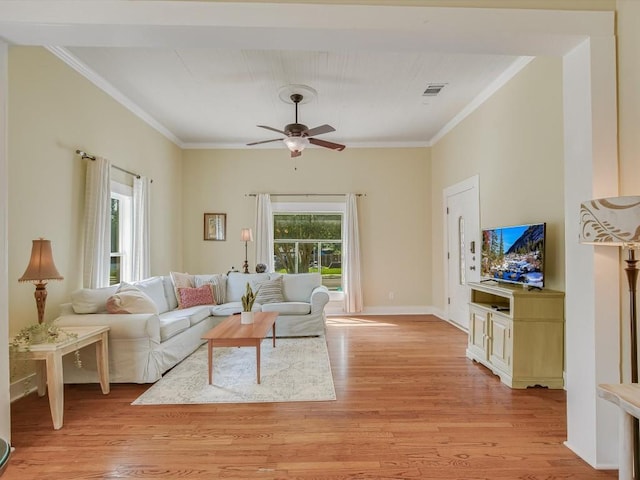 living room with ceiling fan, light hardwood / wood-style floors, and ornamental molding