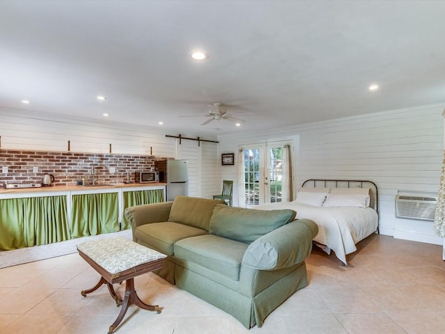 tiled bedroom with stainless steel refrigerator, ceiling fan, access to exterior, an AC wall unit, and ornamental molding