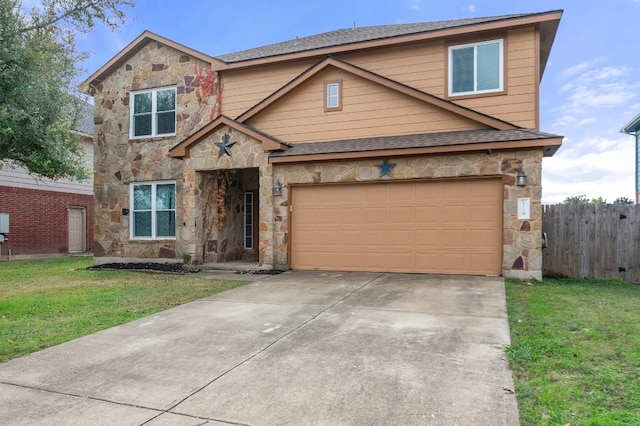 view of front of house with a garage and a front yard