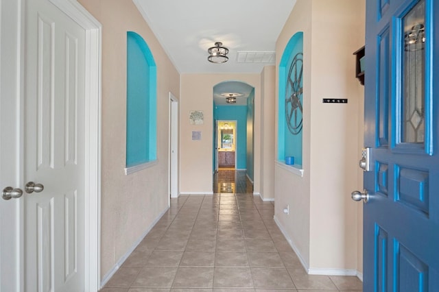 hallway featuring light tile patterned flooring