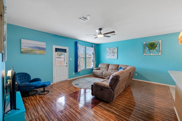 living room featuring ceiling fan