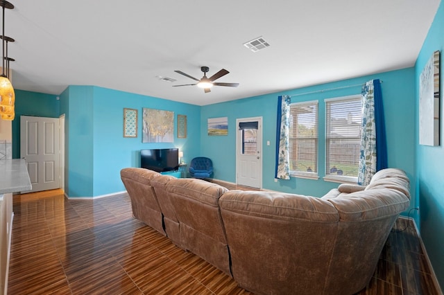 living room with ceiling fan